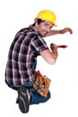 Tradesman using a wrench Royalty Free Stock Photo