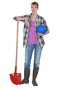 Tradeswoman with her shovel