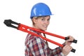 Tradeswoman holding boltcutters