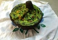 Guacamole in a stone molcajete Royalty Free Stock Photo