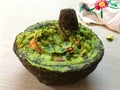 Guacamole in a stone molcajete Royalty Free Stock Photo