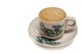 Tradiitional aromatic coffee served in vintage kopitiam cup and saucer in white background