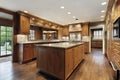 Tradiitional kitchen with oak wood cabinetry Royalty Free Stock Photo