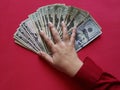 hand of a businesswoman holding american dollars banknotes Royalty Free Stock Photo