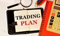 Trading plan. Text label in the planning notebook. Royalty Free Stock Photo