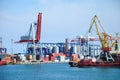 The trading seaport with cranes, cargoes and ship Royalty Free Stock Photo