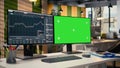 Trading software in proprietary firm office with graphs on green screen PCs Royalty Free Stock Photo