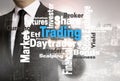 Trading wordcloud touchscreen is shown by businessman Royalty Free Stock Photo