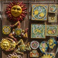 Tradioionic colorful Sicilian ceramics - sun, moon and Trinacria, Italy