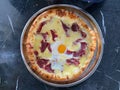 Traditinal Turkish Cuisine Pide with Karadeniz Cheese and Pastirma or Pastrami. Turkish Pizza