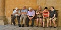 Typical Spain - Old people sitting together on a bench