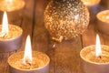 Golden Christmas decoration with candles and baubles Royalty Free Stock Photo