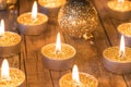 Festive elegant Christmas decoration with golden candles and balls Royalty Free Stock Photo