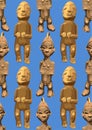 Vector repeated seamless pattern of ancient woodenn sculptures of humans Royalty Free Stock Photo