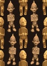 Vector repeated seamless pattern of ancient woodenn sculptures of humans Royalty Free Stock Photo