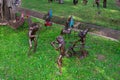 Traditional african handcrafted wooden statues of frogs in the garden of Cultural Heritage store in Arusha, Tanzania