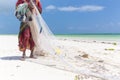 Traditional african local rural fishing on Paje beach, Zanzibar, Tanzania. Royalty Free Stock Photo