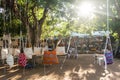 Traditional african market selling colorful bags hanged on trees, Maputo, Mozambique