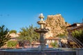 Traditional Afyonkarahisar houses, ornamental pool and Afyon Castle in Afyonkarahisar Turkey Royalty Free Stock Photo