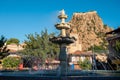 Traditional Afyonkarahisar houses, ornamental pool and Afyon Castle in Afyonkarahisar Turkey Royalty Free Stock Photo