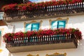 Traditional alpine houses with flowers on balcony, Cortina d'Amp Royalty Free Stock Photo