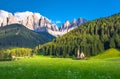 Traditional alpine St Johann church in Val di Funes valley, Santa Maddalena touristic village, Dolomites, Italy.