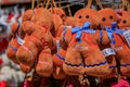 Traditional Alsatian gingerbread man and stork plush toys in Strasbourg, France