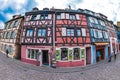 Traditional Alsatian souvenirs shop, with cheerful and romantic decorations on the facade, Colmar, France