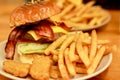 Traditional american burger, Freshly french fries and chicken nuggets Royalty Free Stock Photo