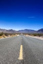 Traditional American Highway Among High Mountains to Death Valley Area Royalty Free Stock Photo