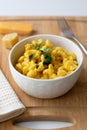Traditional American macaroni and cheese comfort food also called mac n cheese with elbow pasta coated in a cheesy creamy cheddar Royalty Free Stock Photo