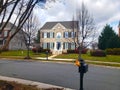 Traditional American residential house. Perfect neighbourhood in suburb, in North America. Luxury houses with nice landscapes Royalty Free Stock Photo