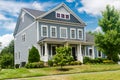 traditional American single-family home with a veranda and lawn Royalty Free Stock Photo