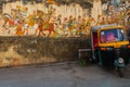 Traditional ancient stile indian wall painting on the old plastered wall in Udaipur, India