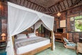 Traditional and Antique Javanese Style Bedroom villa in Bali Royalty Free Stock Photo