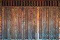 Traditional antique wooden folding door Asian style frame. Thai traditional wooden gate of historical architecture. Beautiful