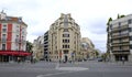 Traditional apartment buildings with typical facades old parisian house with french balconies and flowerpots. France Royalty Free Stock Photo