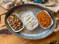 Traditional Appetizer Bulgur or Bulghur Kisir, Celery Salad and Chickpea Lentil Salad. Turkish Greek Food in Copper Tray at Local Royalty Free Stock Photo