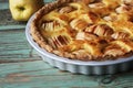 Traditional apple pie, fruit dessert, tart with fresh apples on wooden rustic table Royalty Free Stock Photo