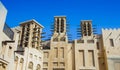 Traditional Arab wind tower for air conditioning and cooling on top of building in Dubai Royalty Free Stock Photo