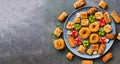 Traditional arabian oriental sweets baklava on gray rustic background. Top view, copy space