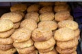 Traditional Arabic buns sprinkled with sesame are sold in a street shop