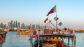 Traditional Arabic Dhow boats along with Doha skyline Royalty Free Stock Photo