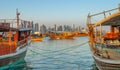 Traditional Arabic Dhow boats along with Doha skyline Royalty Free Stock Photo