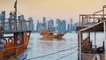 Traditional Arabic Dhow boats along with Doha skyline Royalty Free Stock Photo
