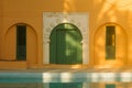 Traditional arabic door of green color with reflections of palm leaves on the wall. Exit to the outdoor pool in the resort`s vill Royalty Free Stock Photo