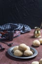 A traditional arabic Egyptian muslim cookie home made shot on a red table with black background