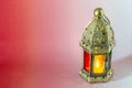 Traditional arabic lantern lit up for celebrating holy month of Ramadan Royalty Free Stock Photo