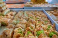 Traditional arabic and turkish sweets pastry dessert kadaif kunafa, baklava, with pistachio