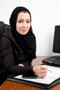 Traditional Arabic young woman at the office